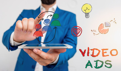 Conceptual hand writing showing Video Ads. Concept meaning Engage audience in the form of video...