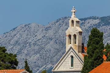 Fototapeta na wymiar Typical church in the centre of small Sucuraj town on Hvar island, Croatia