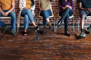 People sitting on their chairs