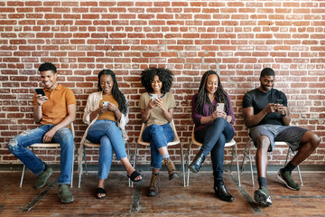 Fototapeta premium People using a smartphone