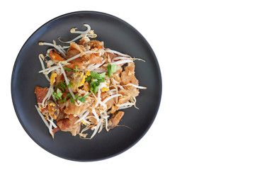 Top view of Crisp fried mussel pancakes or Mussel omelette in black plate isolated on white background included clipping path, Thailand call Hoi Tod .