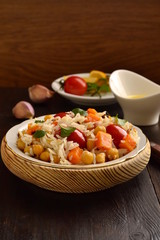 Rice with pumpkin, chickpeas and cherry, vertical 