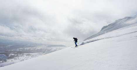 Skiing powder in Hokkaido/Japan with a view - obrazy, fototapety, plakaty