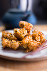 Deep fried chicken with honey and black sesame