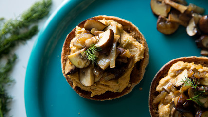 Vegan toast with hummus and mushrooms