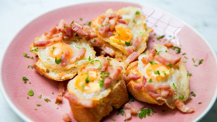 Traditional tapa fried quail eggs with bacon