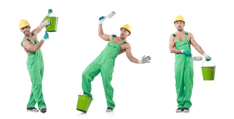Painter in green coveralls on white