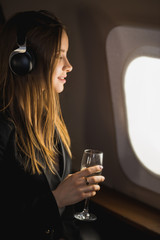 Attractive woman in private jet