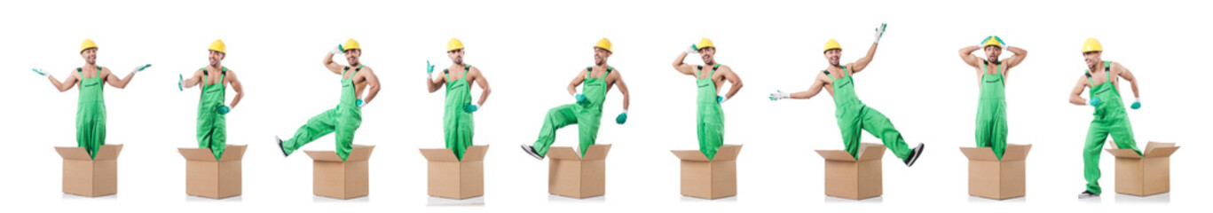 Man in coveralls with boxes