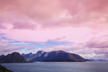 Island on the horizon. Rocks in the sea. Beautiful rocky sea landscape in evening. Wild nature...