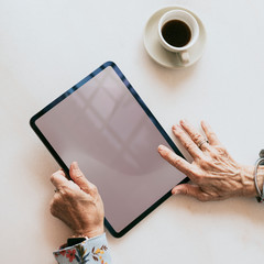 Senior woman tablet user