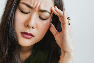 Woman having a bad migraine