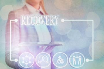 Conceptual hand writing showing Recovery. Concept meaning the return to normal state of health mind...