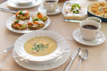 Festive Easter table setting with traditional meals. Easter breakfast in Poland. Christian tradition commemorating the resurrection of Jesus.