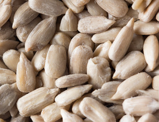 peeled sunflower seeds as background