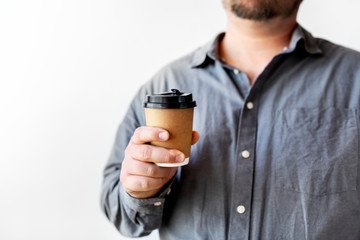Man holding a coffee