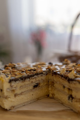 Festive cheesecake on the table with a cup of coffee. Easter time.