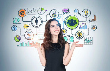 Smiling woman showing business sketch