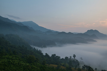 Obraz premium Traveling to see the sea of mist and sunrise in the morning at the view of Phu Lanka, Phayao Province, Thailand