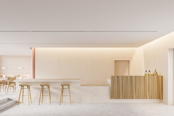 Beige bar interior with counter and sofa