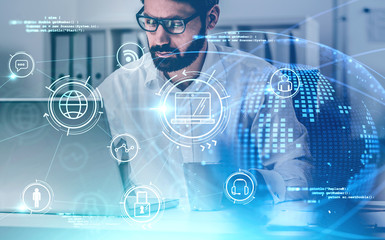 Bearded man with laptop, online business interface