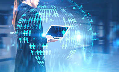 Woman with laptop in office, social network