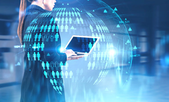 Woman with laptop in office, social network