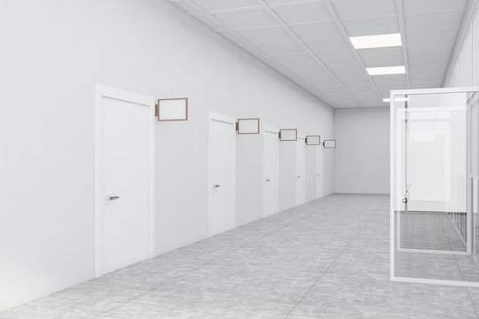 Row Of Doors With Mock Up Signs In White Office