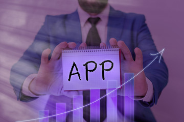 Text sign showing App. Business photo text Computer program Download software by a user to a mobile...