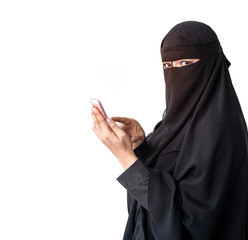 Beautiful Muslim woman wearing black hijab and using smartphone, Muslim woman concept