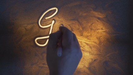 Good Bye! Inscription. Sand On Illuminated Glass.