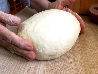 The making of fried panzerotti stuffed with mozzarella and tomato sauce