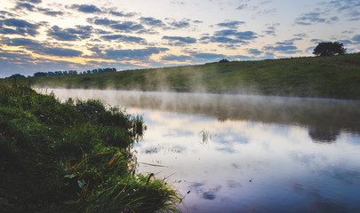 Foggy landscape with river