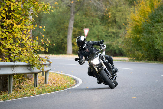 Biker driving through a turn.