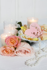 Fototapeta na wymiar Romantic Roses Still Life With Pearls