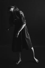 Fototapeta na wymiar Fashion art studio black and white portrait of beautiful girl