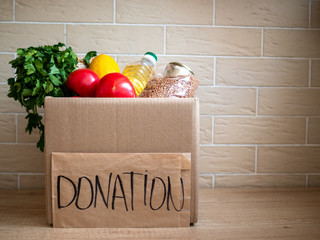 Donation box with goods, neighbourhood help concept at quarantine