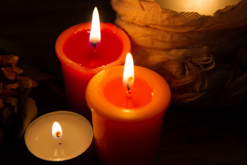 red candles on a dark background