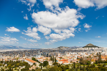 Fototapeta premium Cityscape of Athens and Lycabettus Hill in the background, Athens, Greece.