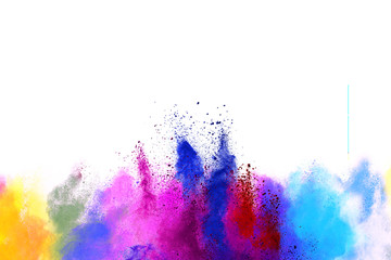 Freeze motion of colorful color powder exploding on white background.