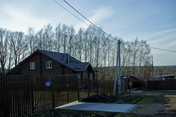 Fototapeta na wymiar a clear autumn day in a dacha village, Russia