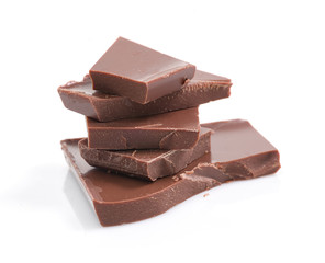 bath of chocolate pieces on white background. Isolated