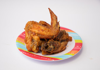 tasty grilled chicken wings isolated on white background.