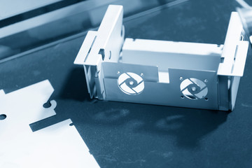 The power supply box  form sheet metal plate production. The hi technology manufacturing process of computer parts by progressive die.