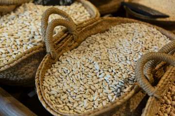 Dried ganxet bean in baskets in grocery shop