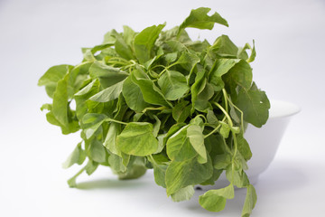 Close up view of (Amaranthus viridis), Bunch of Green Amaranth leaves or bayam hijau isolated on...