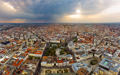 Naklejka premium Europe hungary Budapest. Aerial panoramic cityscape about Budapest with epic sky. A Storm is comming on the background. Famous historical downtown in the foreground with ferris wheel.