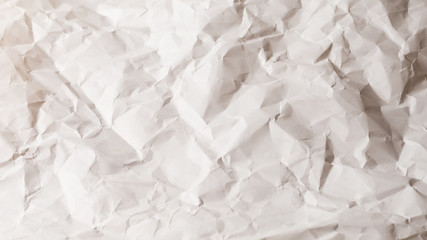 Obraz premium Crumpled white paper background.