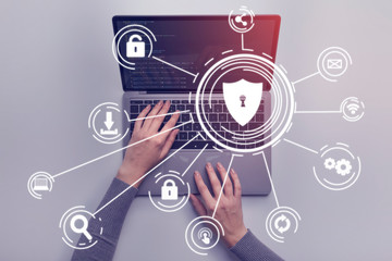 Hacker attack concept. Woman hands on laptop