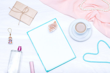 Good, happy morning for woman or girl concept.  Coffee, paper blank, lip gloss, jewelry. Flat lay, copy space.
